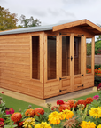 Elkington summer house with double doors in a colourful garden setting by IN Sheds