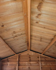 Interior roof construction of weatherboard apex shed showing solid timber framework